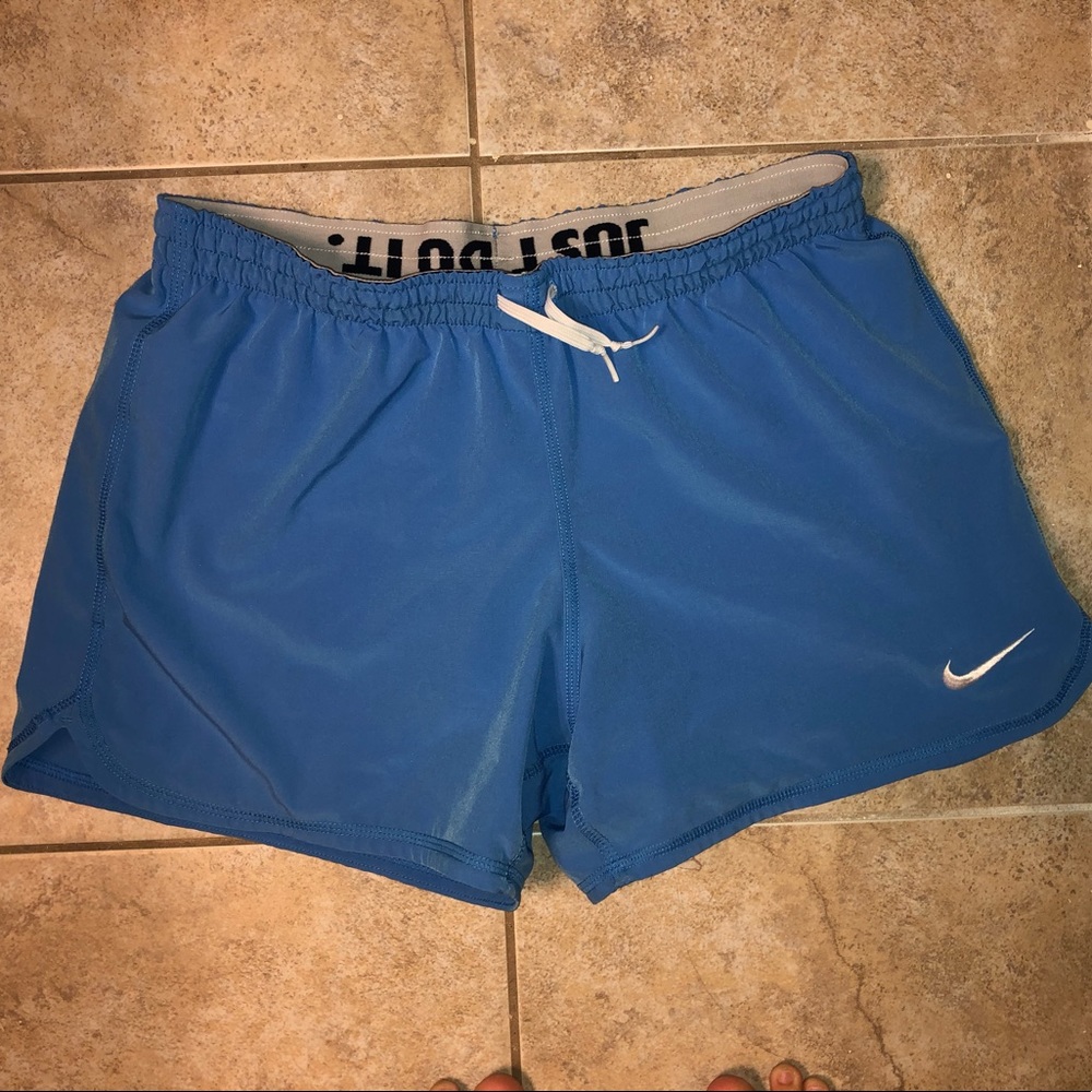 Nike blue shorts with white spandex